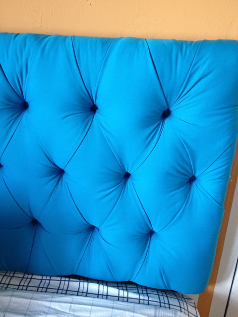 Bright blue DIY tufted headboard