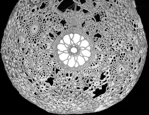 Lit up lace lamp shade in black and white