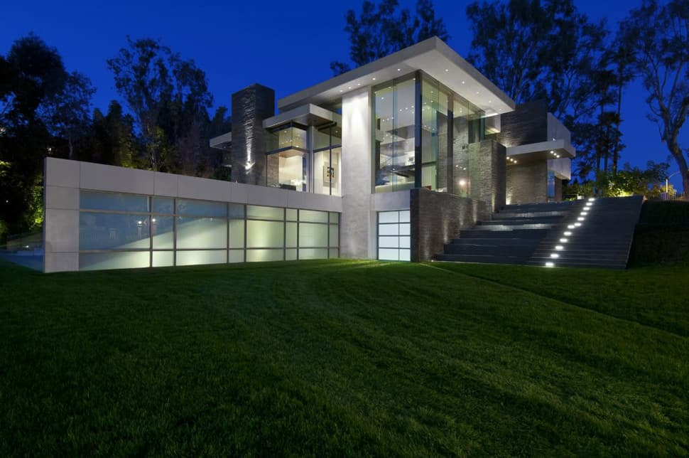 Luxury family home with transparent walls and bowling alley | Modern