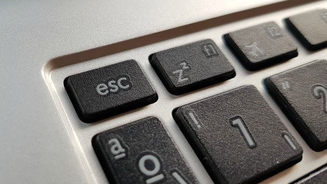 Esc
