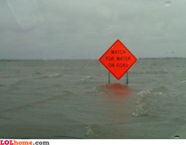 Watch for water on road