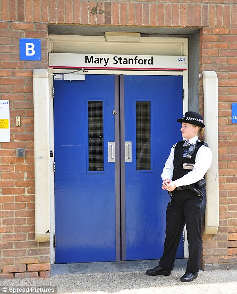 Another guards a second entrance