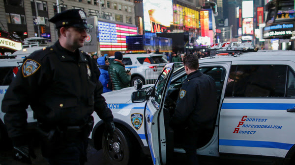 New York Police Department officers prepare for New Year
