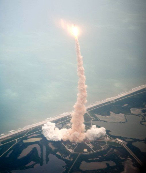 The launch of space shuttle Atlantis from Launch Complex 39A, as seen from a Shuttle Training Aircraft flying over NASA's Kennedy Space Center in Florida on July 8, 2011.