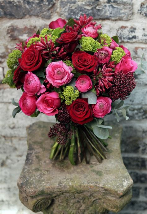 Chamaedorea plant in resin owl pot rs. Seasonal Hand Tied Bouquets | Kensington Flowers