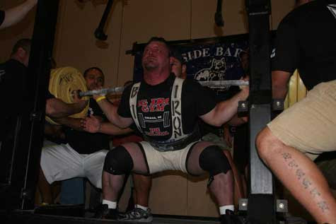 Jim Grandick squatting at the PRO AM