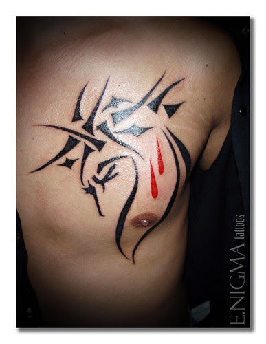 It is a Filipino Tribal tattoo with USMC Semper Fidelis incorporated in the