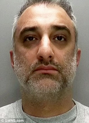 Babur Raja in his police mugshot