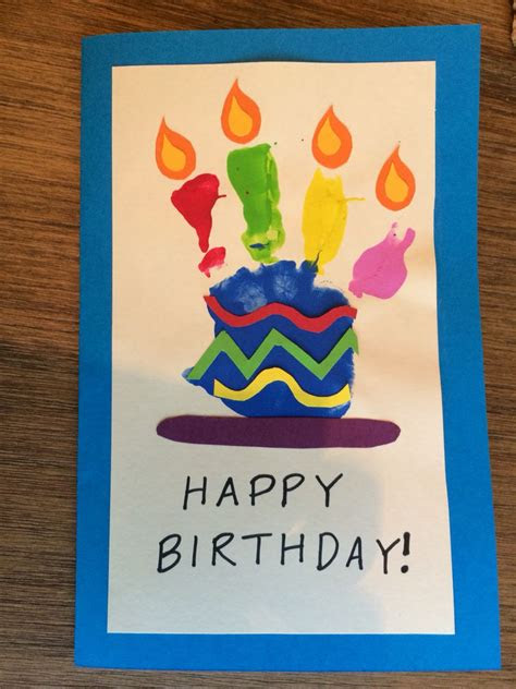 Here are some cute and totally adorable handprint birthday card ideas that you're going to love. toddler handprint happy birthday card birthday card craft happy