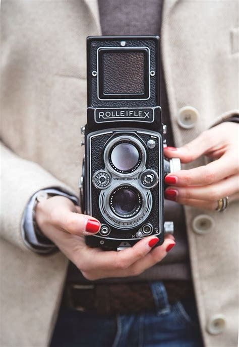 As of september 2012 with sensors bigger than 1/1.7: Woman with Rolleiflex photo camera (old, vintage, retro