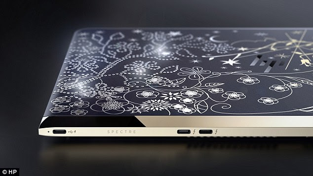 HP also revealed two limited edition versions of the Spectre decorate with lavish materials like 18-karat gold and Swarovski crystals (pictured).  'We are showcasing the possibilities of marrying technology with glitz and glamour, allowing the PC to become an expression of style,' HP's vice president of design Stacy Wolff said