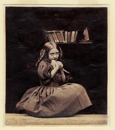 Girl with dove by George Eastman House.
