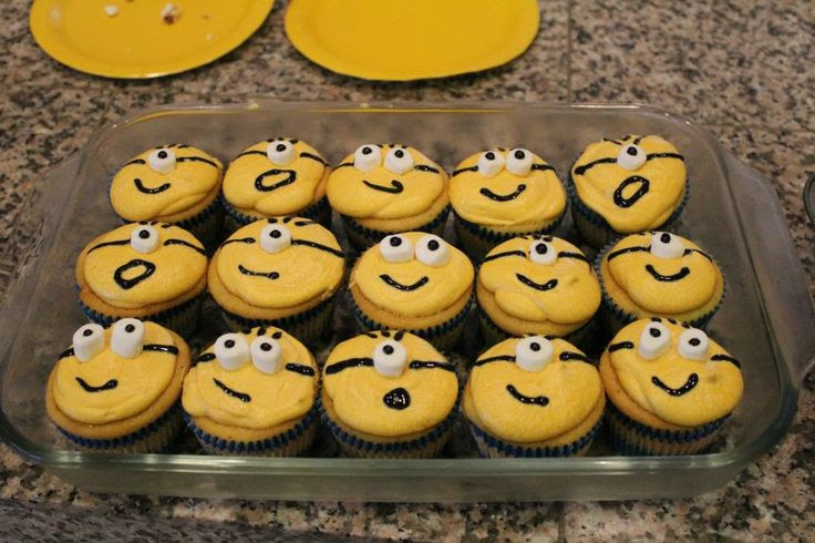 Super easy Despicable Me Minion cupcakes. Use mini marshmallows for the eyes. Total time saver and the kids still loved them!
