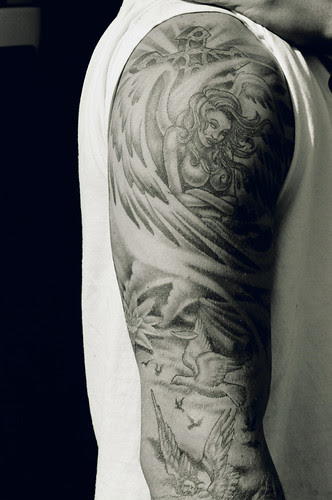 arm sleeve tattoo. Tribal arm tattoos.