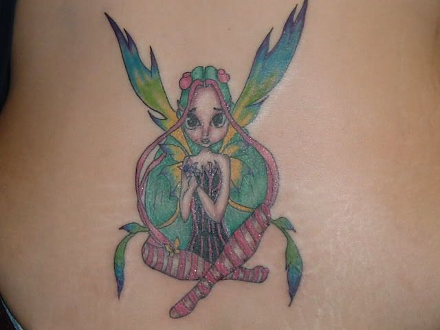 Modest Fairy Tattoos With Small Wings