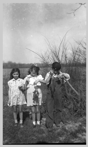 Three children and the catch.