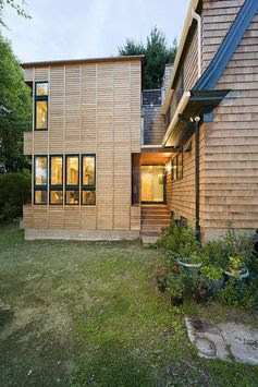 A traditional house gets a modern addition.