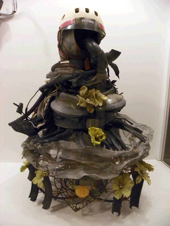 , Likes to Bike , mixed media found object sculpture, Bike pARTs ...