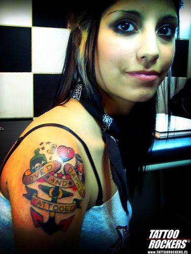 Rockers Love Tattoo Design on Women Upper Arm Rockers Love Tattoo Design on Women Upper Arm