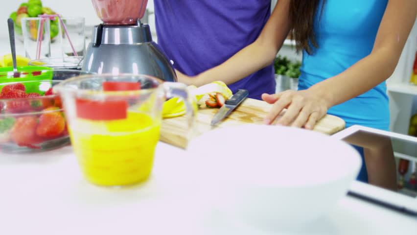 Healthy Asian Chinese Couple Home Kitchen Counter Making Nutritious Fresh Homemade Fruit Juice ...