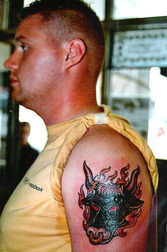 taurus tattoo. taurus bull cover up tattoo