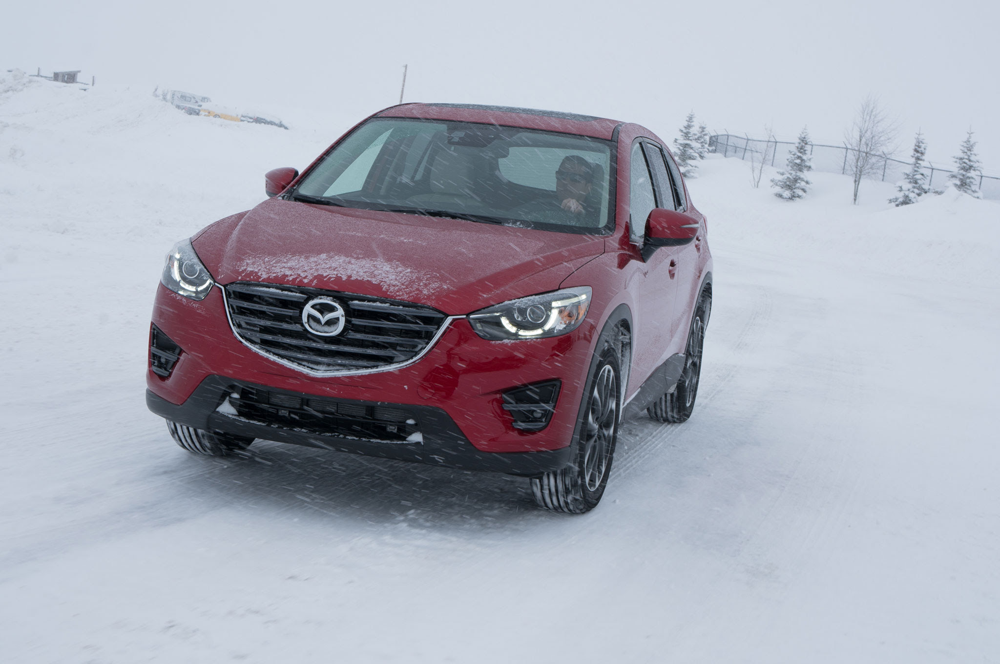 2016 Mazda CX 5 front three quarter in motion 01