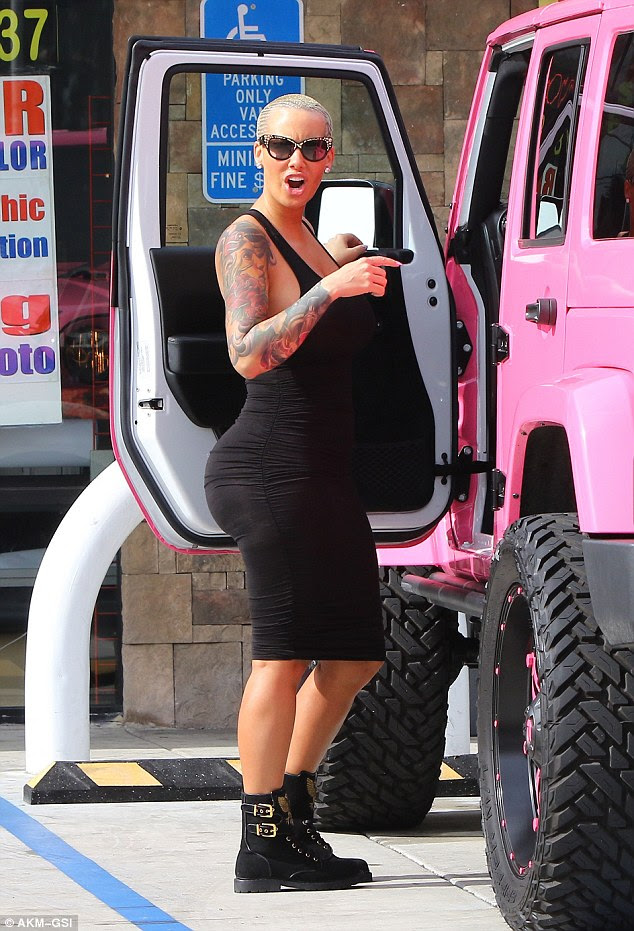 So fine: Amber Rose parked her enormous pink Jeep in a disabled spot outside liqour store on Friday