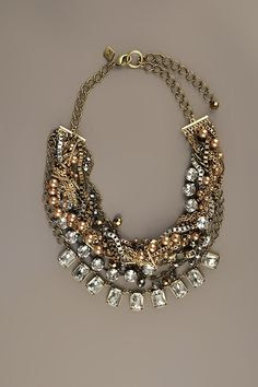 SEQUIN | Multi Chain And Crystal Statement Necklace in Gold - StyleSays