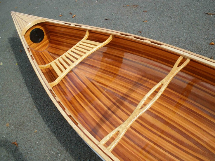 Cedar strip canoe. I like the waterproof compartment behind the 