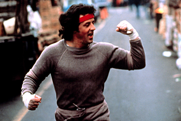 rocky-flexing-bicep-sweater