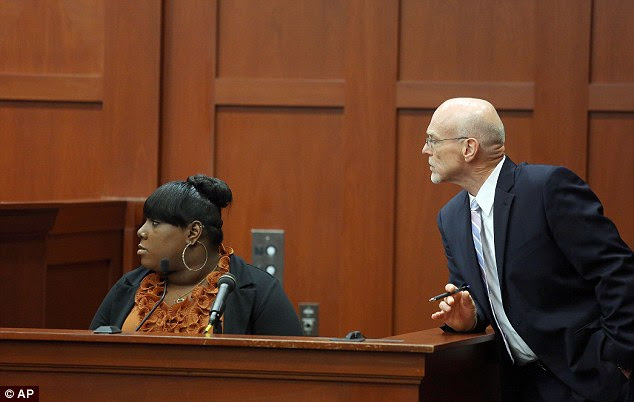 Tense: Witness Rachel Jeantel, left, continues her testimony to defense attorney Don West on day 14 during George Zimmerman's trial in Seminole circuit court in Sanford, Florida 