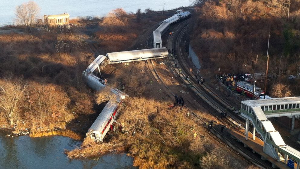 PHOTO: Cars from a Metro-North passenger train are scattered after the train derailed in the Bronx neighborhood of New York, Sunday, Dec. 1, 2013.