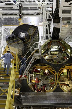 Endeavour's left Orbital Maneuvering System (OMS) pod is prepared for re-installation onto the vehicle on March 19, 2012.