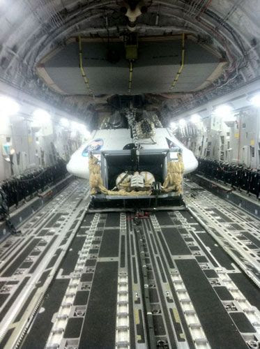 The Orion test article prior to being deployed from a C-17 cargo plane for a parachute test on July 18, 2012.