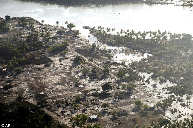 No one spared: An aerial of Hihifo on the western side of Tonga after the first powerful earthquake sent tsunami waves sweeping through the Pacific
