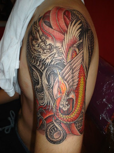 Chinese and Japanese Tribal Dragon Tattoos
