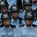 A protester in Hong Kong confronting the riot police at the city government headquarters, where tensions rose on Saturday.