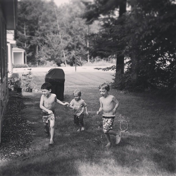 Yesterday's summertime activity- running through a sprinkler.