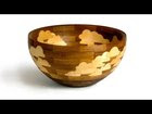 Woodworker making a beautiful maple bowl with clouds