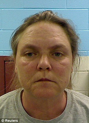Joyce Hardin Garrard is seen in a booking photo released by the Etowah County Sheriffís Office in Etowah County