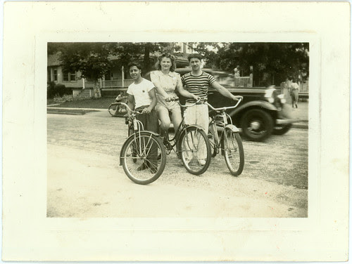 Three with bicycles
