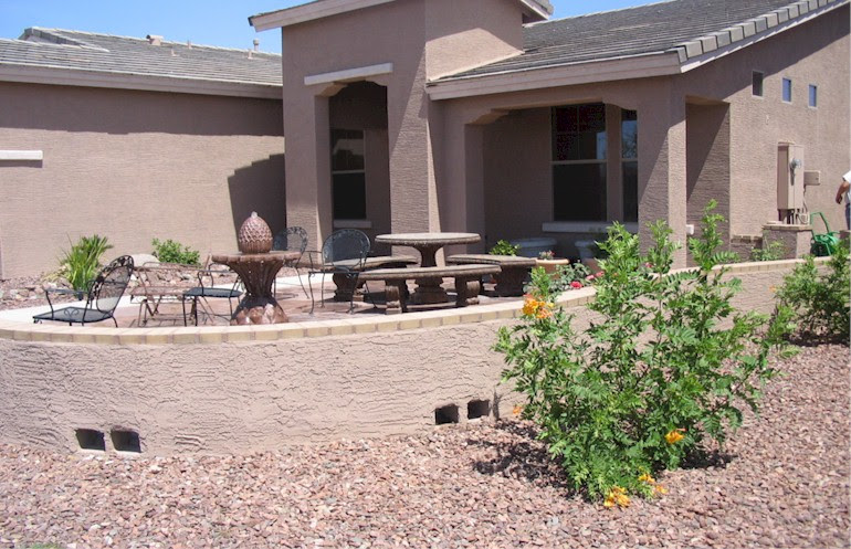 Arizona desert landscape design with riverbeds, rock, plants