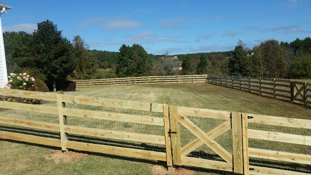 4 rail wood with 2x4 wire criss cross gates - mcintyre fencing