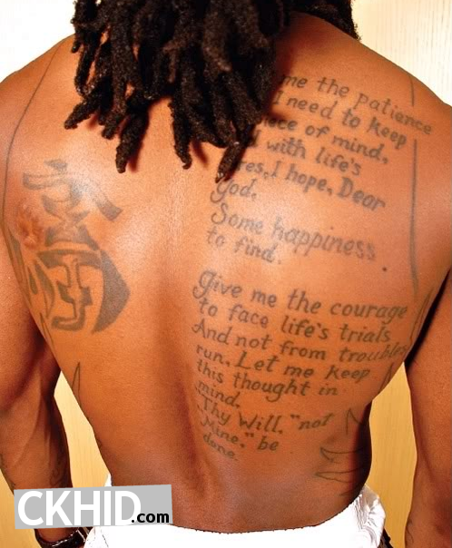 lil wayne tattoo on forehead. Lil Wayne Tattoos Pics show