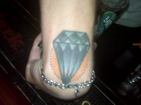 diamond tattoo + a thoughtfully positioned bracelet = a man Y LA REV can get diamond tattoo + a thoughtfully positioned bracelet = a man Y LA REV can get