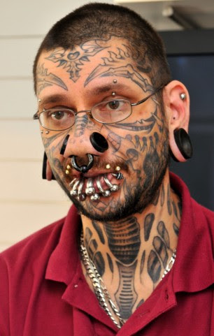 Denial: Rouslan Toumaniantz, who runs the tattoo parlour, says Kimberley 