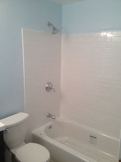 Everyone enjoys a nice hot shower (or bath), but our bathroom walls don't love the extend. Create a Waterproof Bathtub Wall for Less than $50