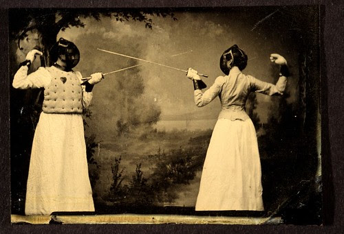 Two women fencing by George Eastman House.