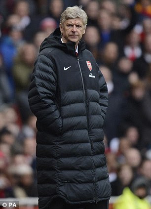 Nervous: Both Arsene Wenger and Mark Hughes have been under pressure for different reasons
