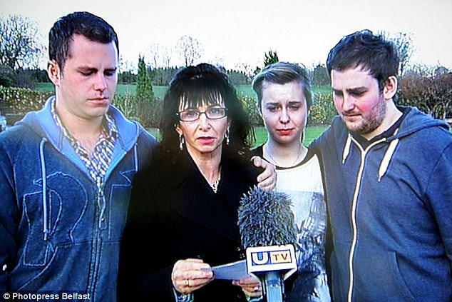 Grieving: Mother Nuala Kerr, centre left, has called on anyone who has any information to come forward after her son was murdered